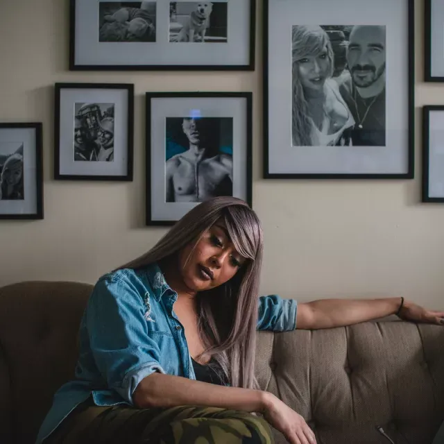 Portrait of Nya Cruz on the couch.